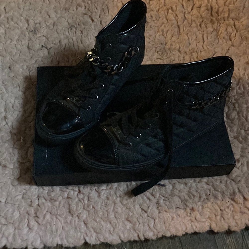 All black high top sneakers